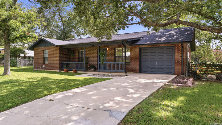 Property Photo: 208 E Mayer St TX 78160