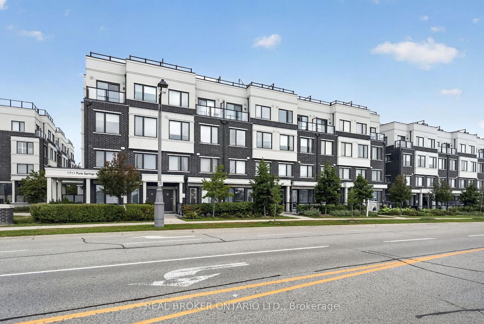 Property Photo: 1711 Pure Springs Boulevard 521 ON L1X 0E3