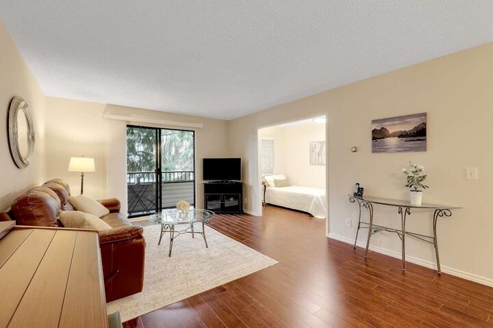 Property Photo:  20460 54 Avenue 211  BC V3A 6N6 