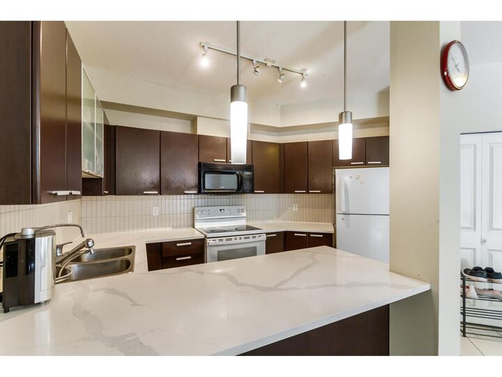 Property Photo:  10499 University Drive 301  BC V3T 0A4 