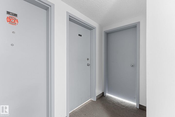 Property Photo:  14004 26 Street NW 108  AB T5Y 1Y4 