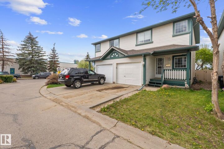 Property Photo:  #2 15215 126 St NW  AB T5X 5Z3 
