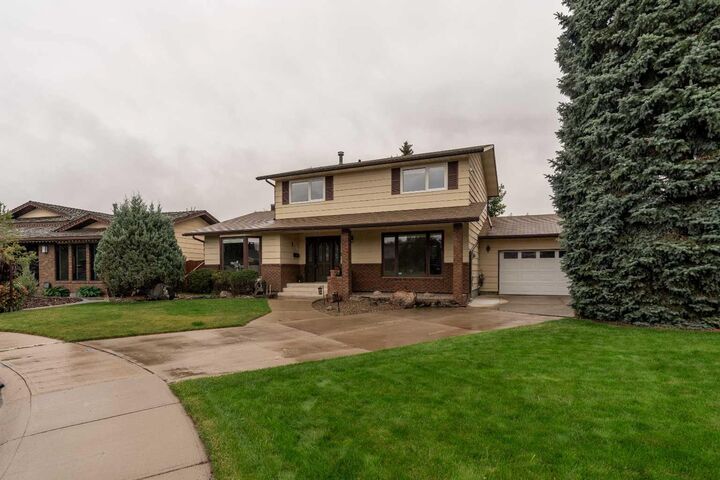 Property Photo:  310 Kings Bay S  AB T1K 5G2 
