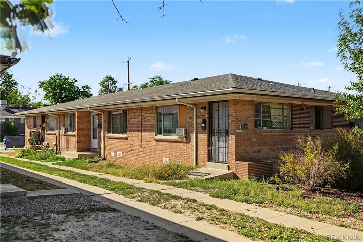 Property Photo:  1765 Chester Street  CO 80010 