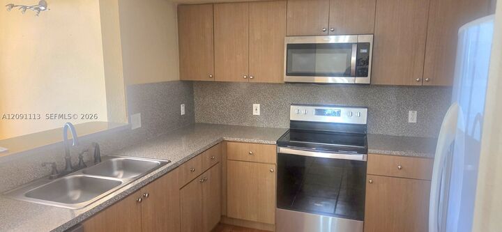 Property Photo:  9300 Fontainebleau Blvd E213  FL 33172 