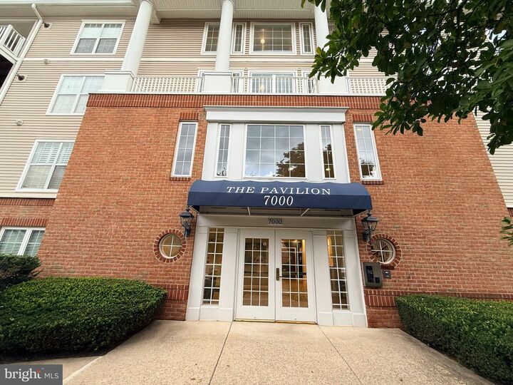 Property Photo: 7000 Falls Reach Drive 203 VA 22043