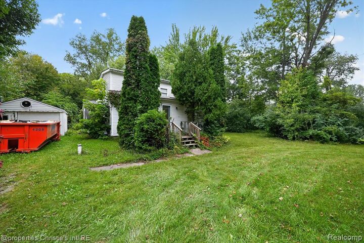 Property Photo:  8320 McKean Road  MI 48191 9705 