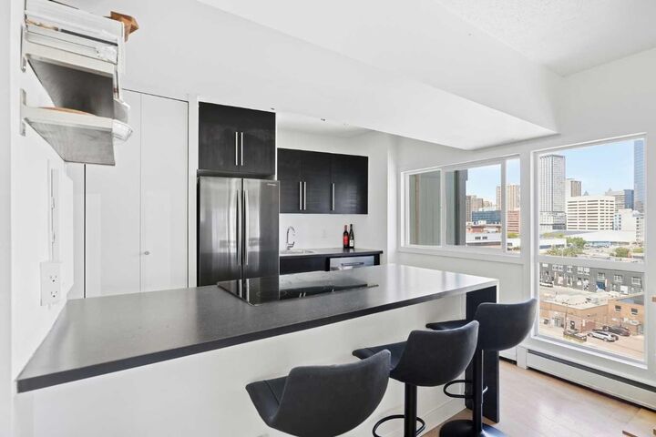 Property Photo:  1209 6 Street SW 1004  AB T2R 0Z5 