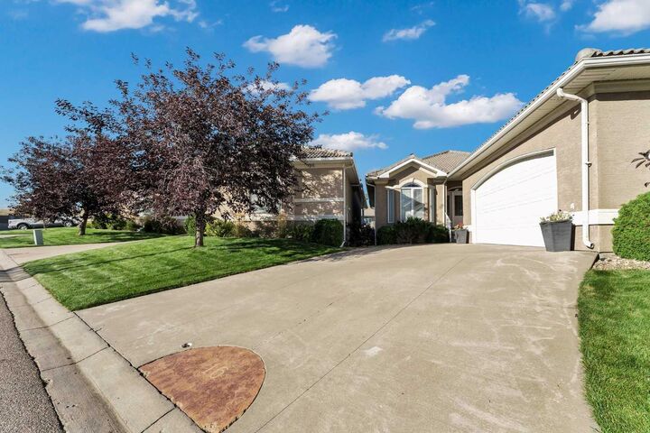 Property Photo: 16 River Ridge Court NW AB T1A 8V4
