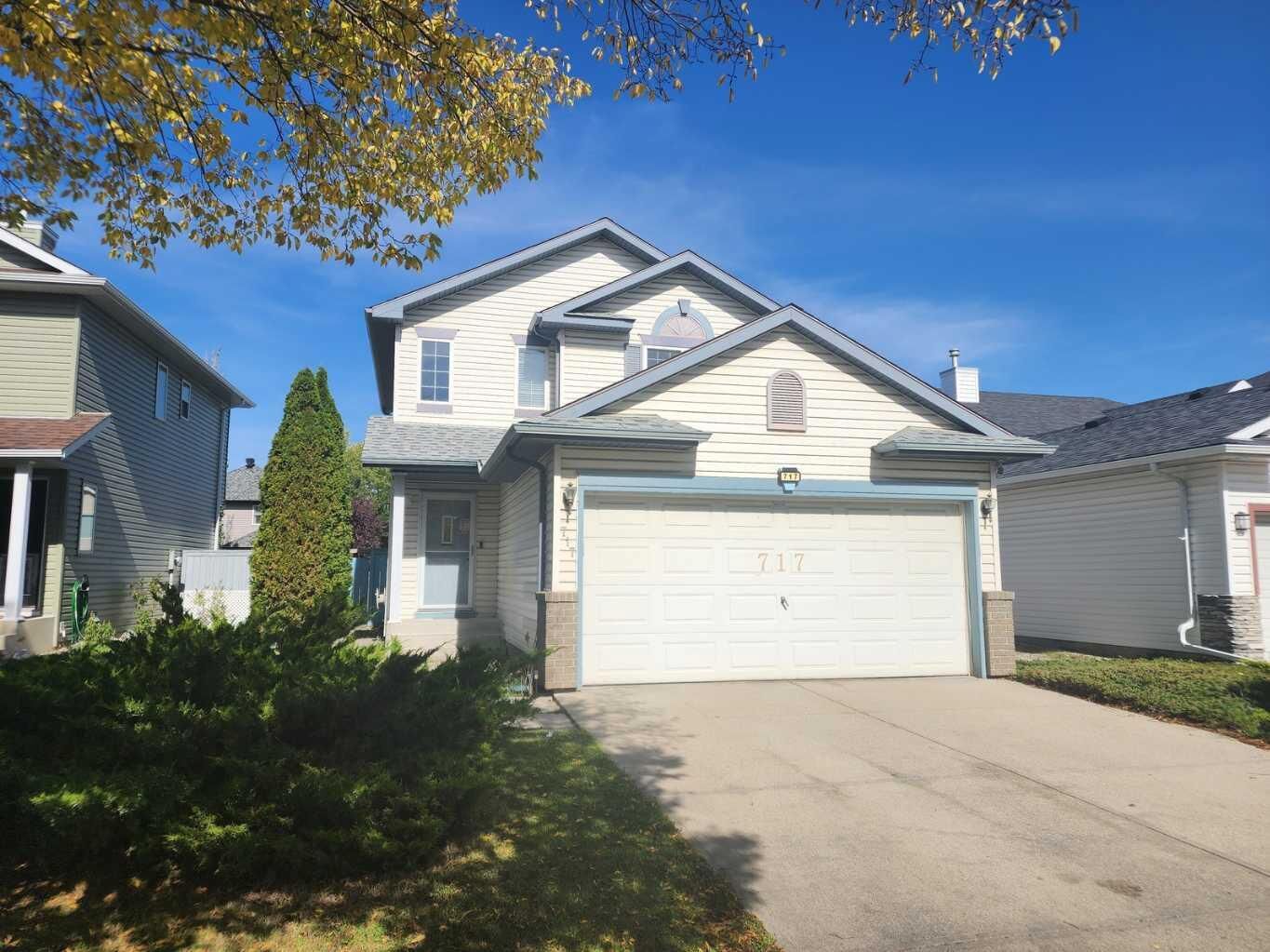Property Photo:  717 Harvest Hills Drive NE  AB T3K 4R3 