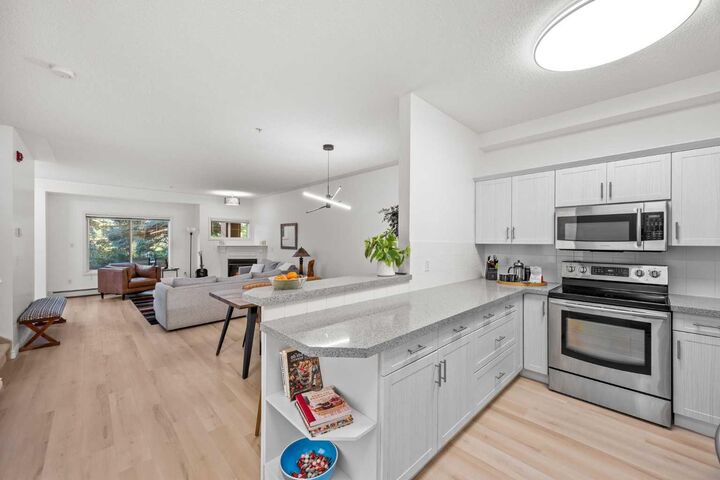 Property Photo:  1110 5 Avenue NW 122  AB T2N 0R6 