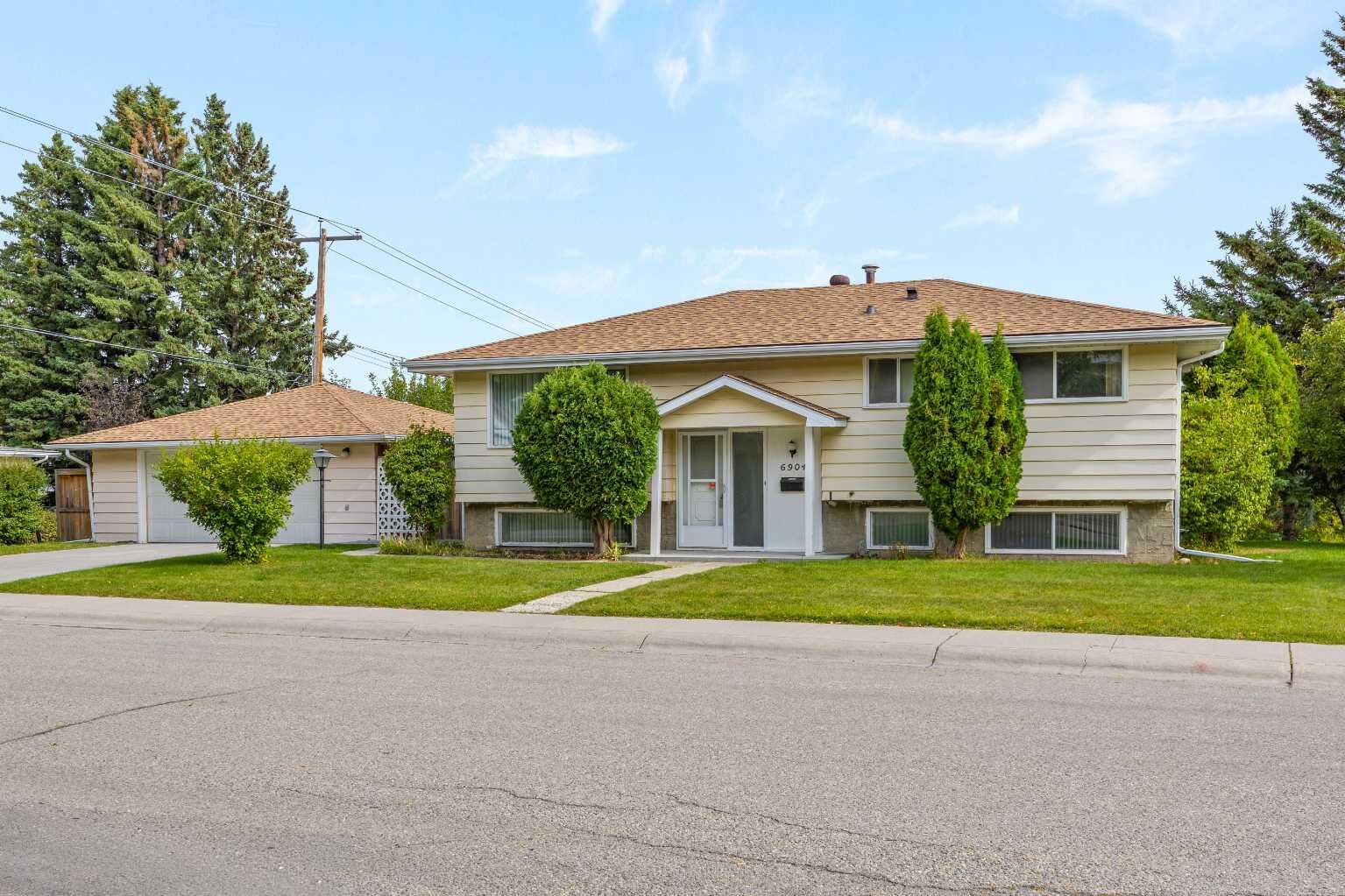 Property Photo:  6904 8 Street NW  AB T2K 1G1 