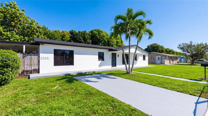 Property Photo: 3355 NW 180th St FL 33056