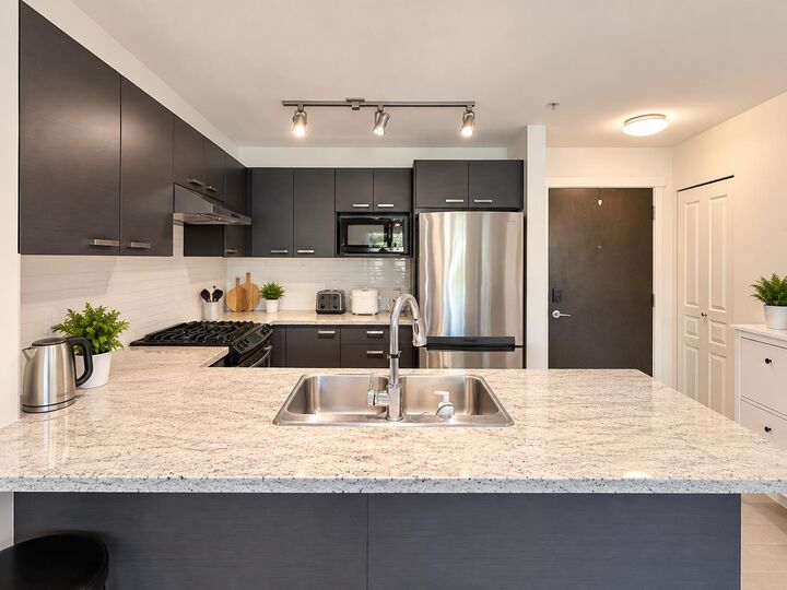 Property Photo: 9399 Tomicki Avenue 218 BC V6X 0H6