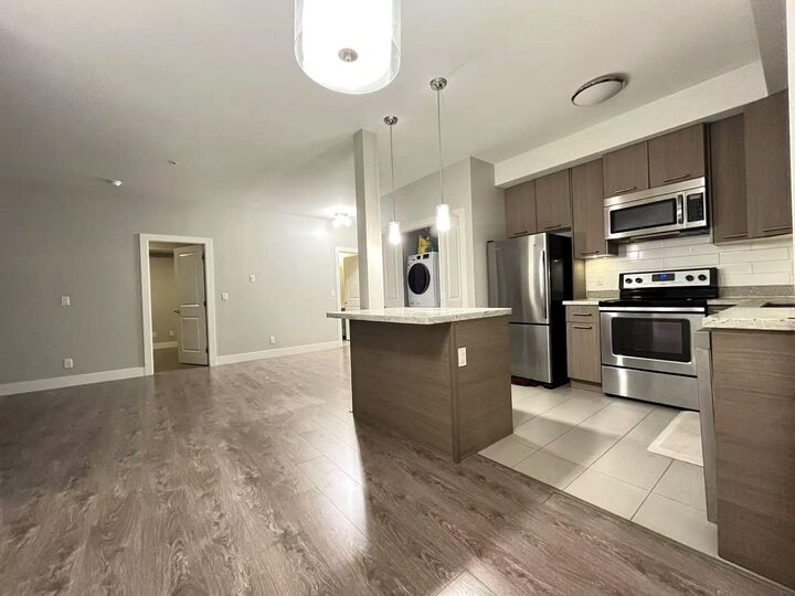Property Photo:  7377 14th Avenue 305  BC V3N 1Z7 