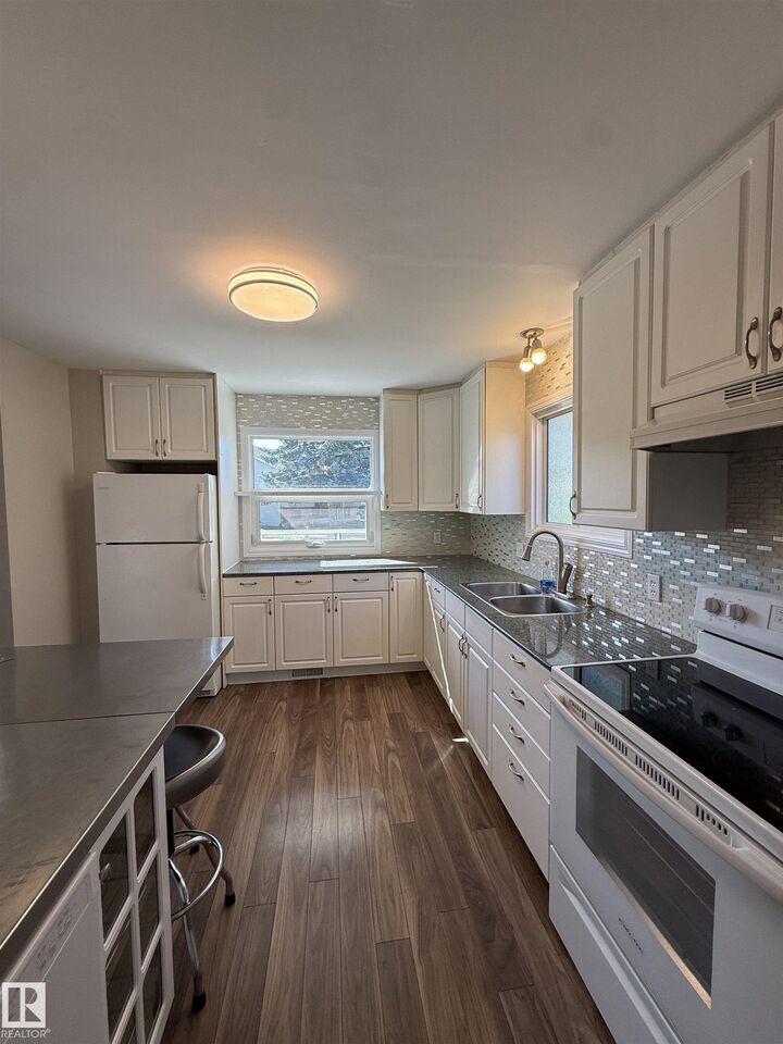 Property Photo: 3723 46 Street NW AB T6L 3T7