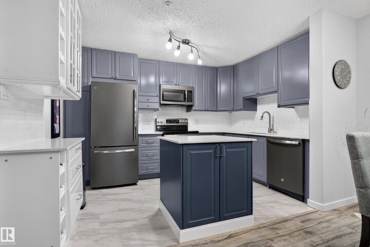 Property Photo: 2098 Blackmud Creek Drive SW 118 AB T6W 1T7