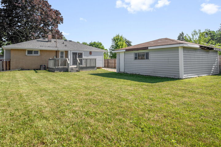 Property Photo:  7719 W Winfield Ave  WI 53218 