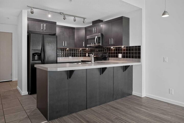Property Photo:  1410 1 Street SE 1509  AB T2G 5T7 