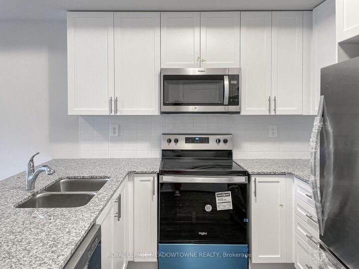 Property Photo:  1565 Rose Way 107  ON L9T 7E7 