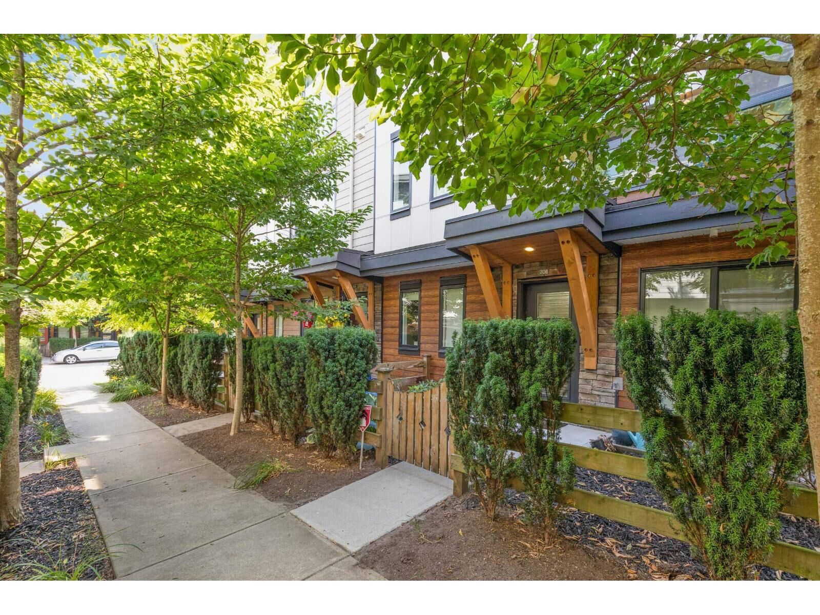 Property Photo: 16488 64 Avenue 208 BC V3S 6X6