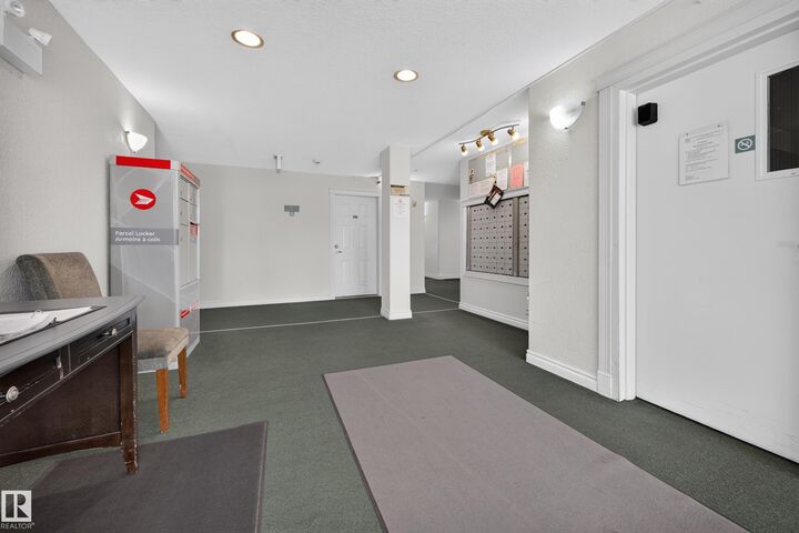 Property Photo:  13635 34 Street NW 407  AB T5A 0C4 