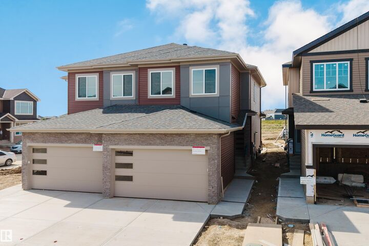 Property Photo:  8510 223A Street NW  AB T5T 8A2 