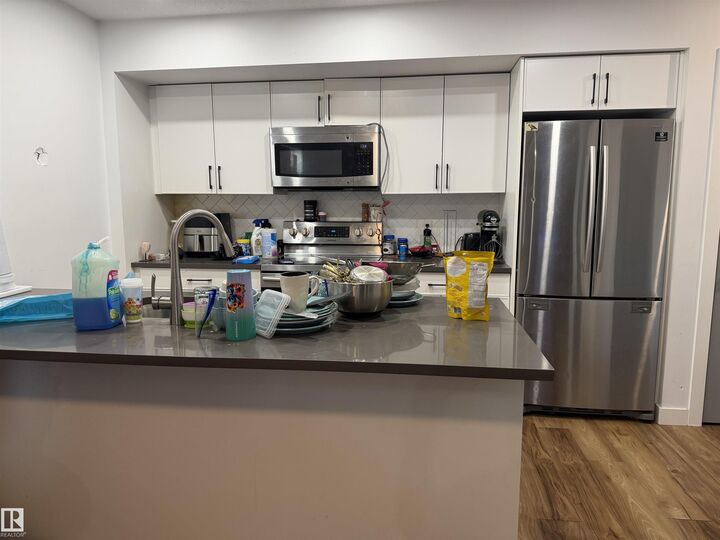 Property Photo:  11442 82 Street NW  AB T5B 2V4 