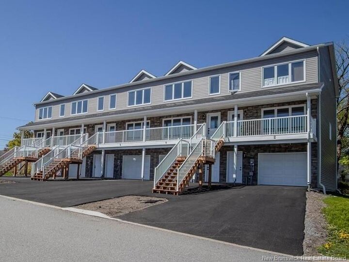 Property Photo:  4 Rockingstone Drive  NB E2M 0B5 