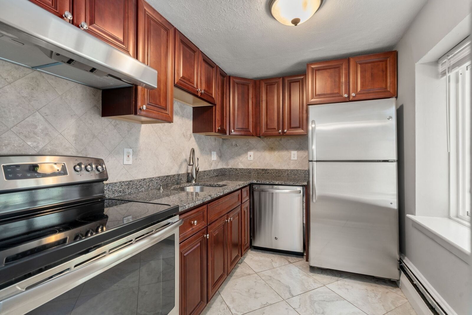 Property Photo:  133 Beaconsfield 44  MA 02445 