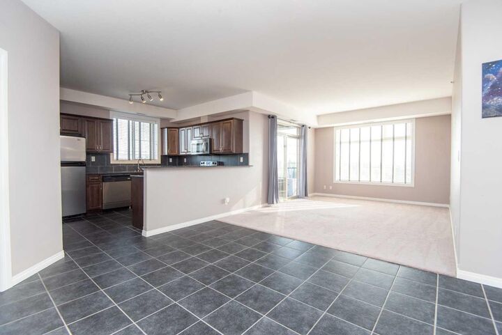 Property Photo:  69 Ironstone Drive 402  AB T4R 0J8 