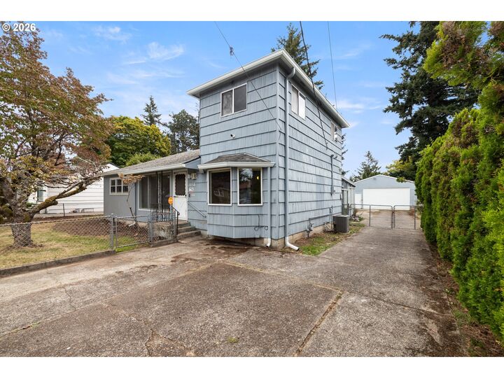 Property Photo:  13056 SE Center St  OR 97236 