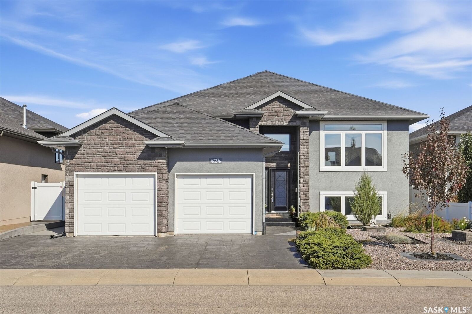 Property Photo:  424 Faldo Crescent  SK S0K 4S1 
