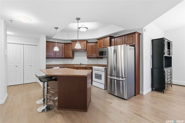 Property Photo:  619 Saskatchewan Crescent W 112  SK S7M 0A5 