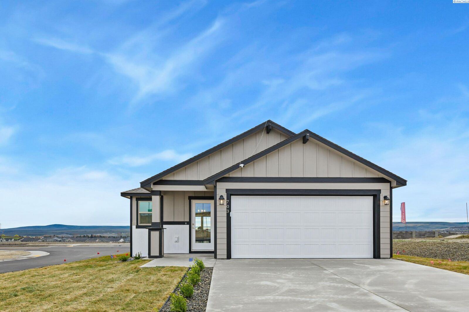 Property Photo:  703 Honeylicious St  WA 99352 