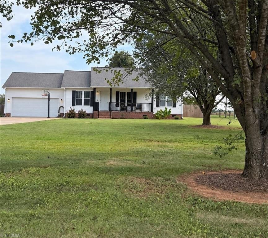 Property Photo:  7580 Woodleaf Road  NC 27054 
