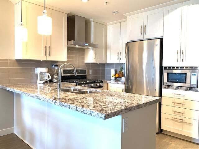 Property Photo:  5011 Springs Boulevard #211  BC V4M 0A5 