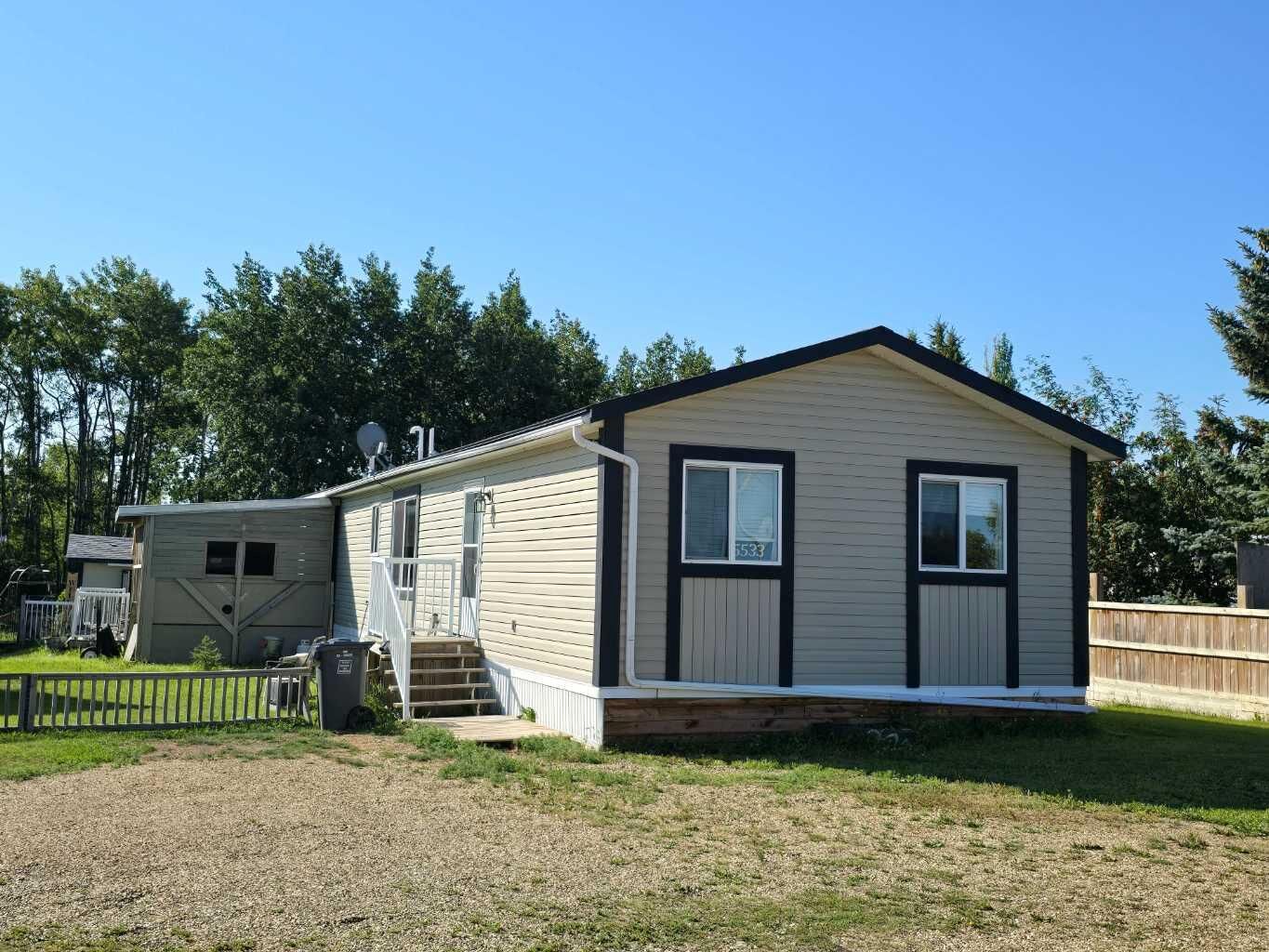 Property Photo:  5533 And 5531 51 Street  AB T0H 0E0 
