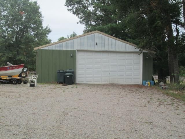 Property Photo:  N10338 Queens Way  WI 54646 