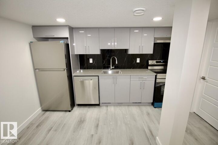 Property Photo:  1929 Davidson Wynd SW Bsmt  AB T6W 3J4 