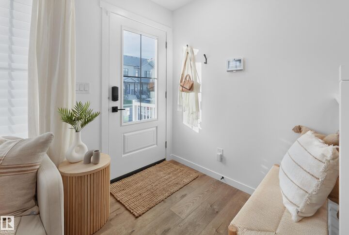 Property Photo:  20934 24 Avenue NW  AB T6M 3B9 
