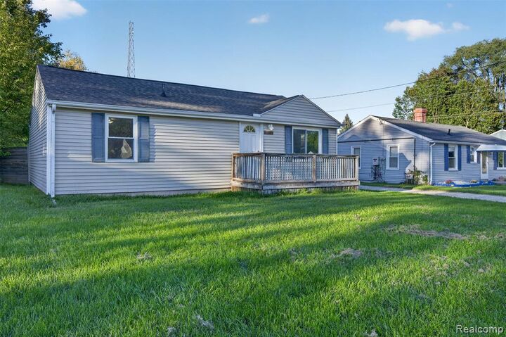Property Photo:  5465 Raymond Avenue  MI 48509 1927 