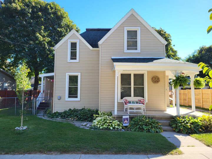 Property Photo:  108 W Upright Street  MI 49720 