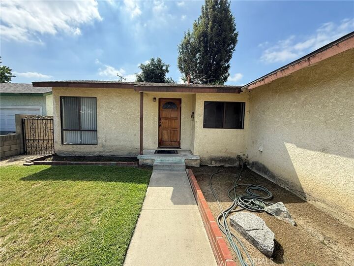 Property Photo:  8718 Olive Street  CA 90706 