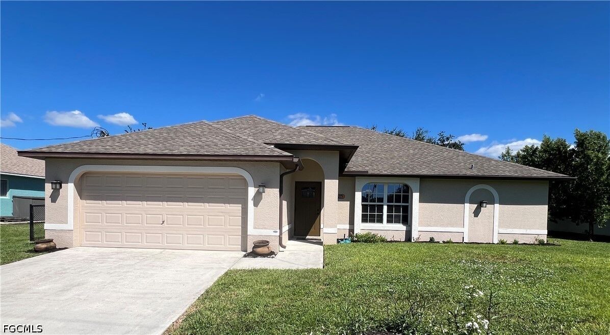 Property Photo:  225 SW 26th Place  FL 33991 