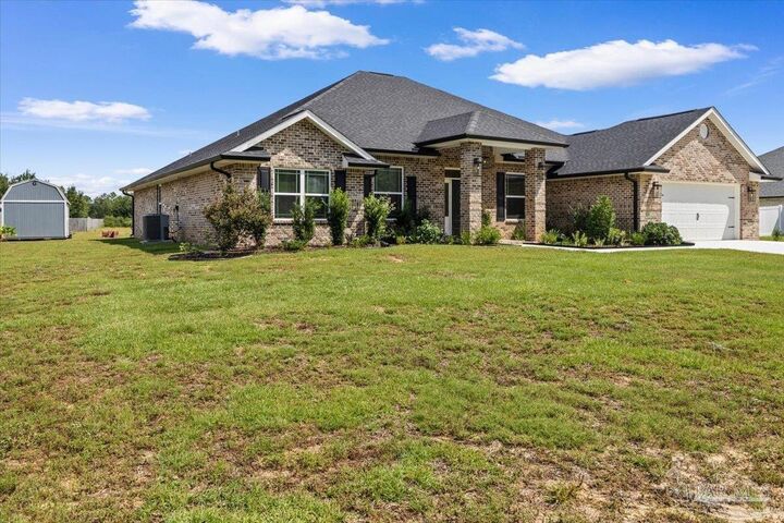 Property Photo:  9741 Shangri La West Rd  FL 32583 