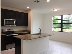 Property Photo:  335 NW 33rd Lane  FL 33069 