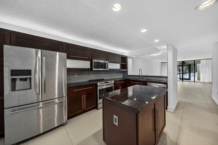 Property Photo:  1100 SE 5th Court 53  FL 33060 