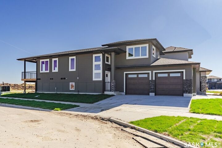 Property Photo:  492 Woolf Bend  SK S7W 1E4 