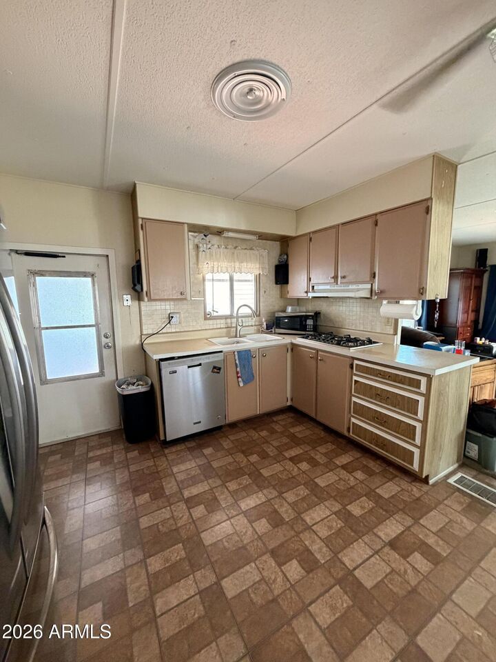 Property Photo:  10220 E Apache Trail 56  AZ 85120 